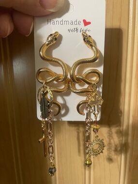 Hand Crafted Gold Snake Dangle Earrings with Cross & Sun Charms